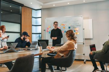 group of employees collaborating in an office